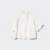 Kort, boksformet skjorte i nylon for damer | Halv erme