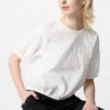 Seersucker-bluse med voluminøse ermer for kvinner