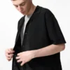Unisex vaskbar strikket skjorte | Kort erme