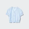 V-halsbluse i bomulls-dobby for damer